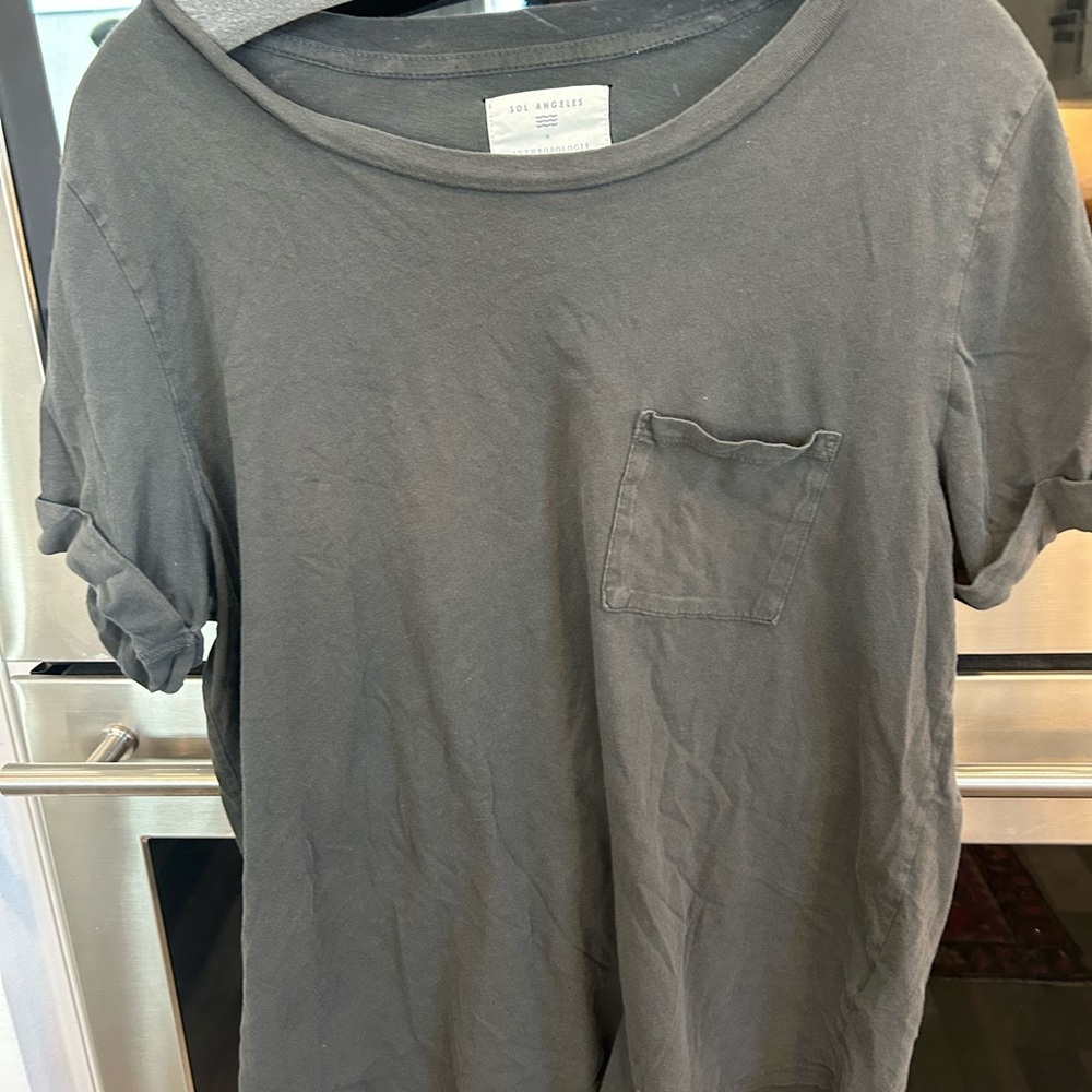 Sol Angeles X Anthropologie Charcoal Tshirt has wear stains holes
